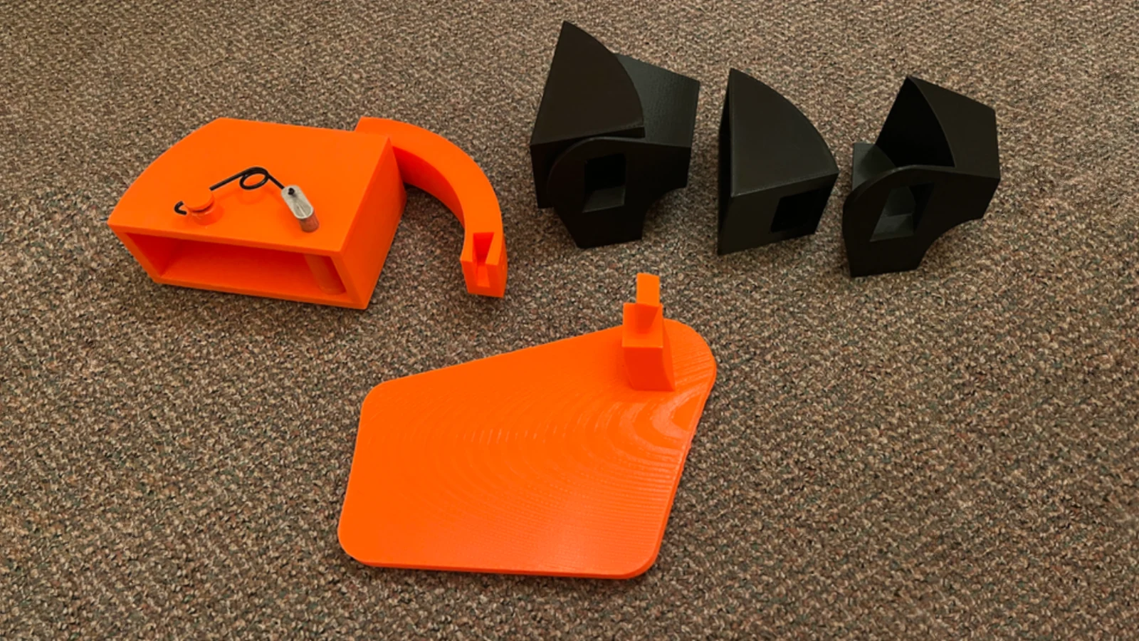 Printed charging port housing and lid prototypes